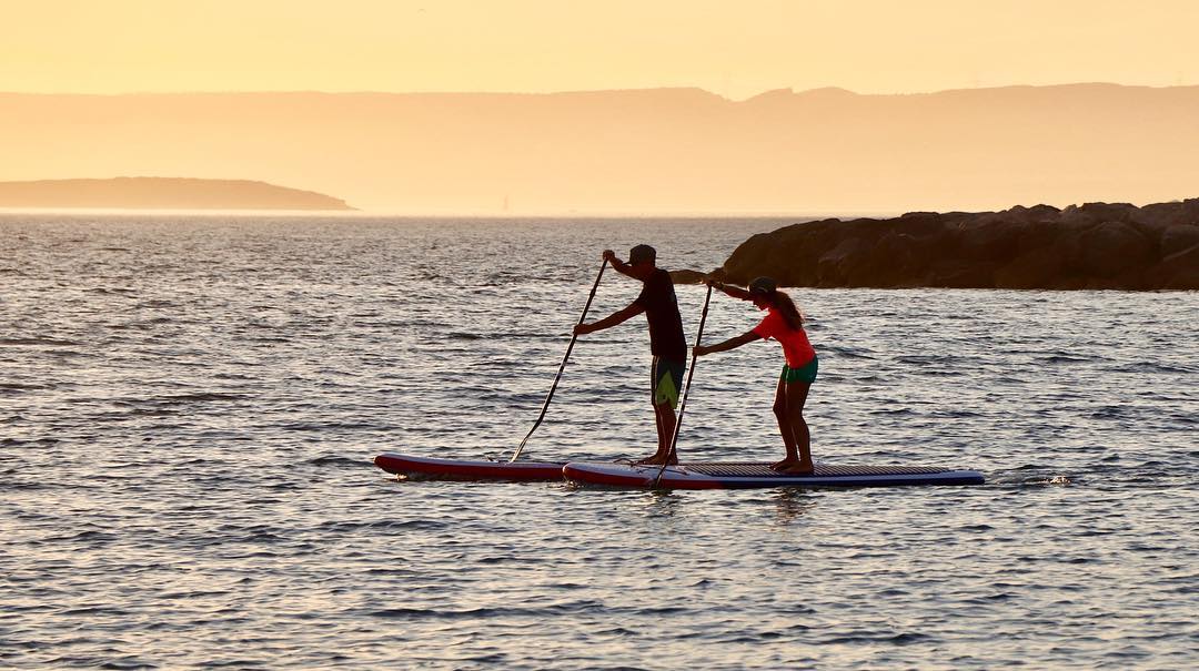 technique de rame stand up paddle sunset